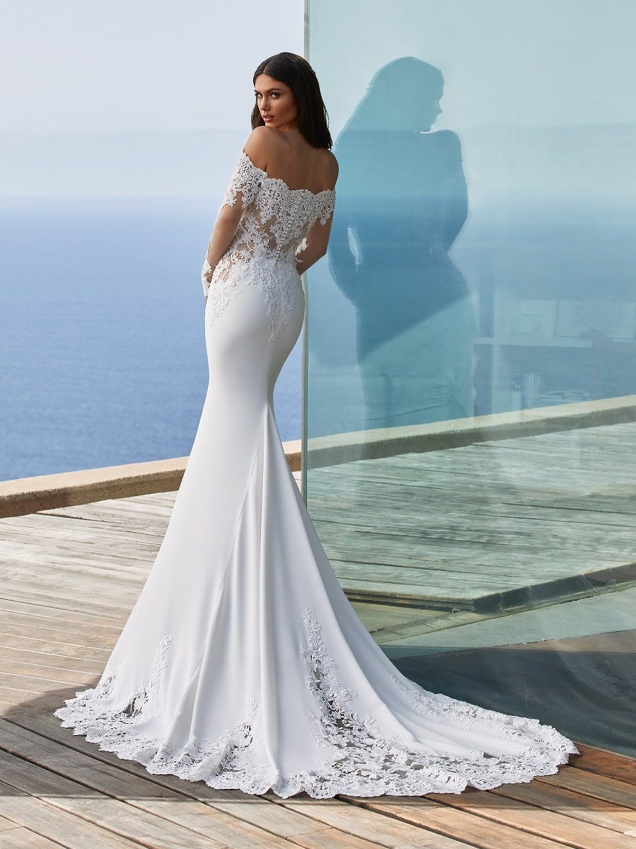 DELLA | Mermaid wedding dress with wraparound neckline | Pronovias