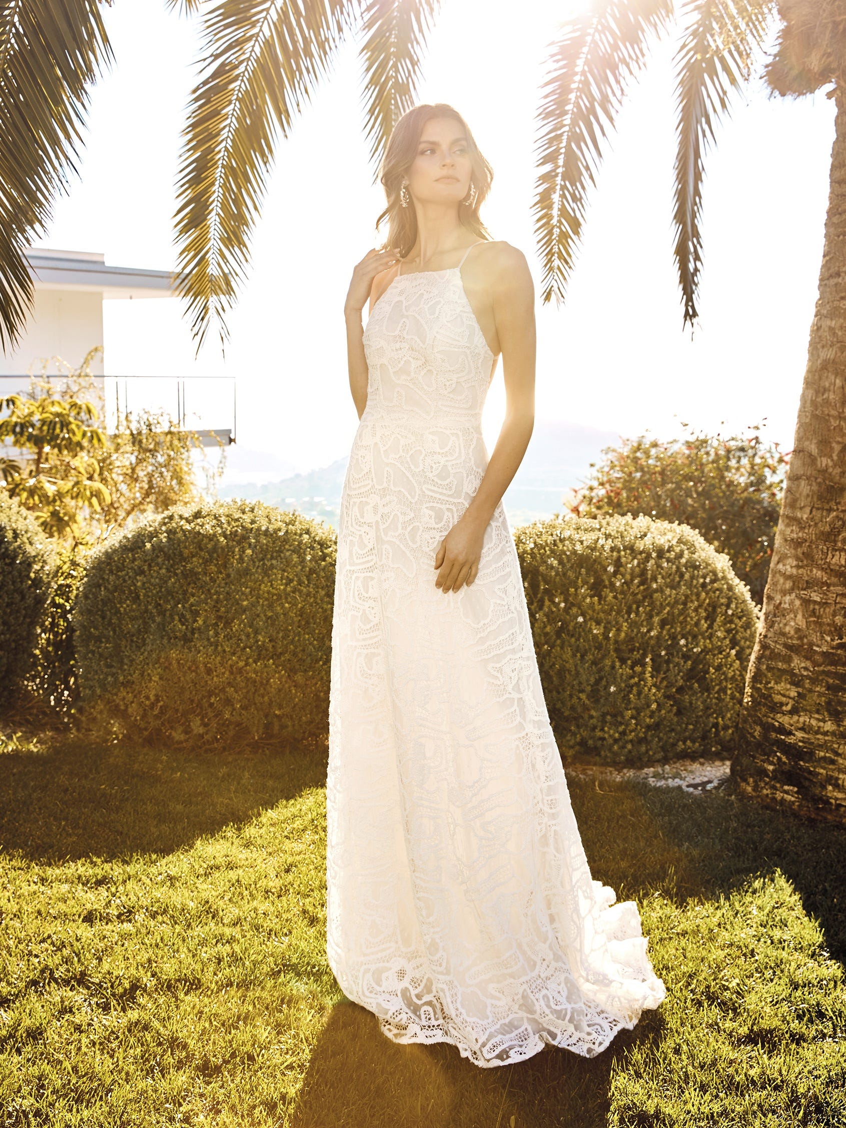 Style 66017: This romantic halter A-line wedding dress creates pure  sophistication. It feat…